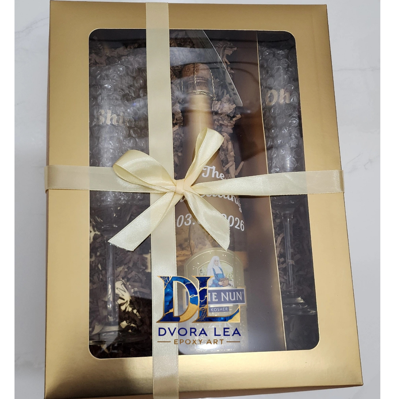 שמפניה וכוסות לחתן וכלה ממותג שמות